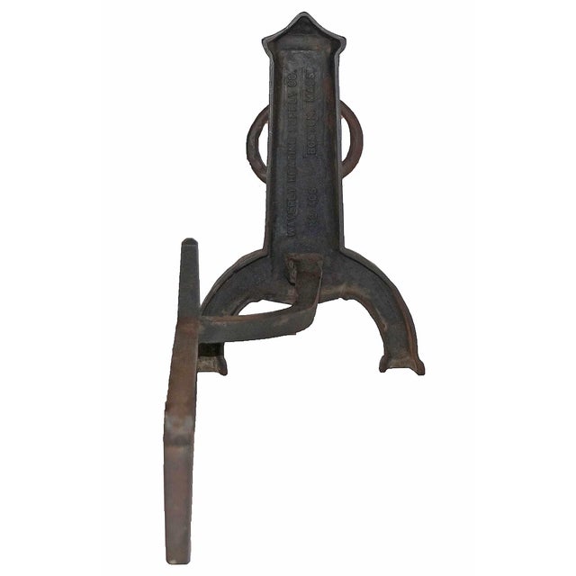 Antique Arts and Crafts style iron fireplace andirons with ring pulls. Stamped on back ´Waverly Heating Supply Co. No 406,...