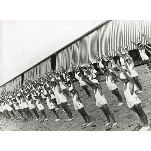 Physical Training Session is an original Black and white photograph realized in Turin by an Anonymous Italian...