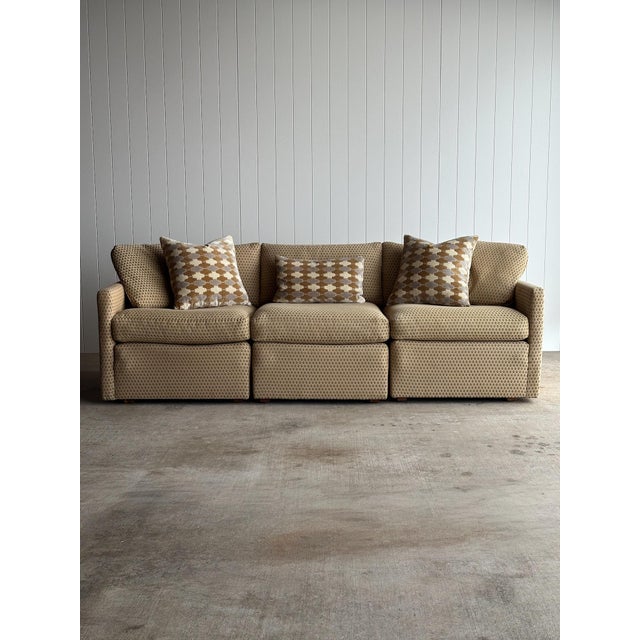 Vintage three-piece modular sectional sofa with squared arms and a low, grounded profile. Original patterned upholstery in...