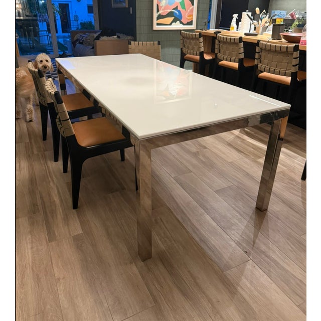 Mitchell Gold + Bob Williams White Quartz Dining Table w/ Parson's Style Chrome Base This is the 84” table. The company...