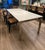Mitchell Gold + Bob Williams White Quartz Dining Table w/ Parson's Style Chrome Base This is the 84” table. The company...
