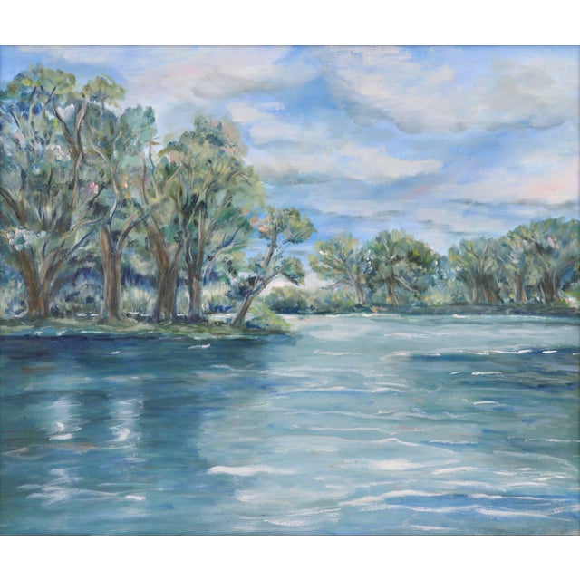 Cheerful landscape of a vivid blue lake surrounded by trees on a bright, sunny day by San Francisco artist Frederico...