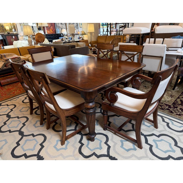 Design Plus Gallery presents a Near Vintage Empire Style Dining Room Table + Six Chairs from Hickory Chair Company. The...