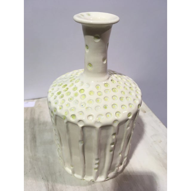 Beautiful, textural vase. The simple lines and colors are elegant and the detail is finely made! Signed and in perfect...