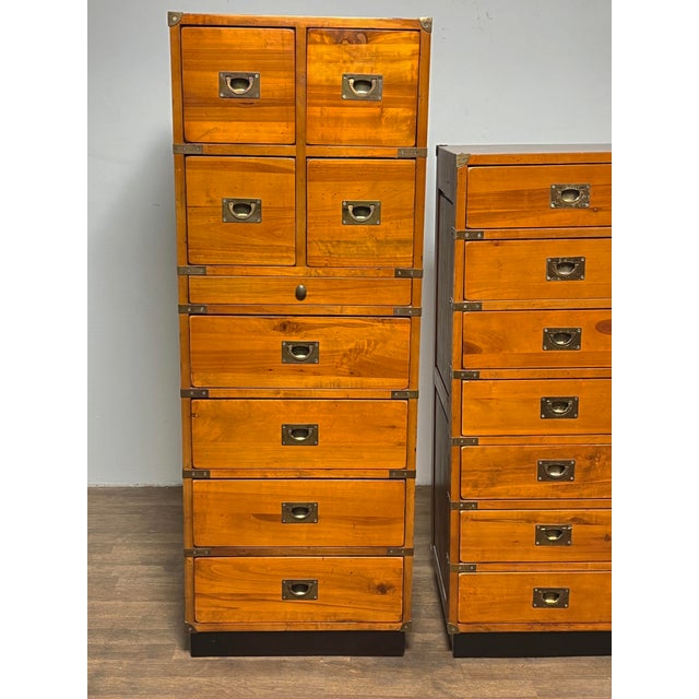 A pair of vintage campaign (cabinet de voyages) chests in amber toned solid pine with brass hardware, made in France, ca....