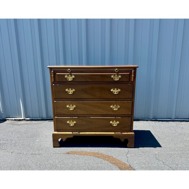 Vintage Late 20th Century Kittinger Bachelor's Chest, model WA-1031 from their officially-licensed collection of Colonial...
