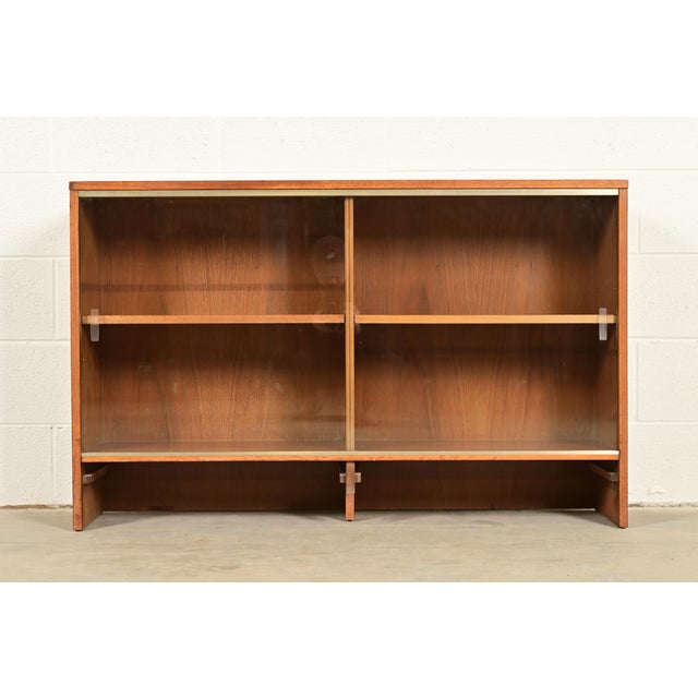A sleek and stylish Mid-Century Modern bookcase, credenza, or display cabinet By Paul McCobb for Calvin Furniture, "Linear...