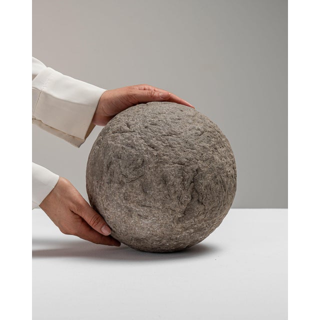 This 18th century decorative object from Belgium is finished in gray, worked in stone. Its form follows honest, well-...