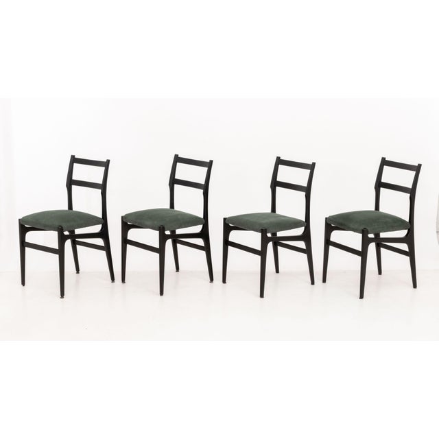 Gio Ponti (Italian, 1891-1979) for Cassina Set of Eight "646 Leggera" Dining Chairs, black lacquered ash wood and...
