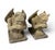 This striking pair of vintage gargoyle statues features two crouched, contemplative figures with expressive faces, small...