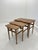 This fine set of 3 nesting tables was designed by Kurt Østervig for Jason Møbler. These high-quality pieces are made from...