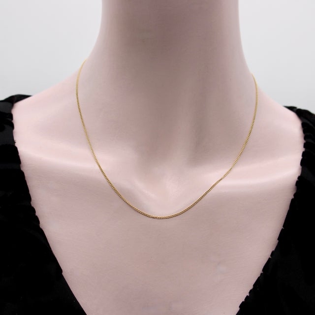 This vintage 14k gold chain is a great option for a simple chain for swapping out charms and pendants. It consists of a...
