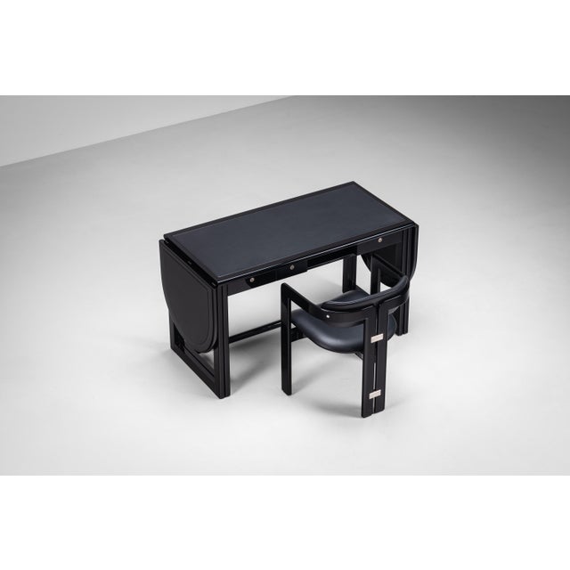 An exceptionally rare and highly collectible desk designed by Augusto Savini for Pozzi, offered together with its original...