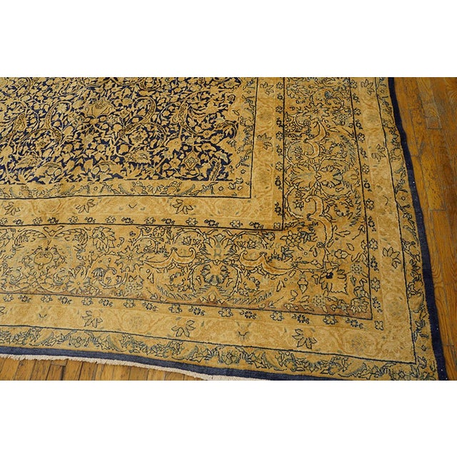 Textile Traditional Floral-Medallion Design on Navy Background and Camel Border Color Antique Persian Kirman Rug For Sale - Image 7 of 7