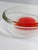 A striking Murano sommerso glass bowl produced in Italy during the 1970s, combining exceptional clarity with bold colour...