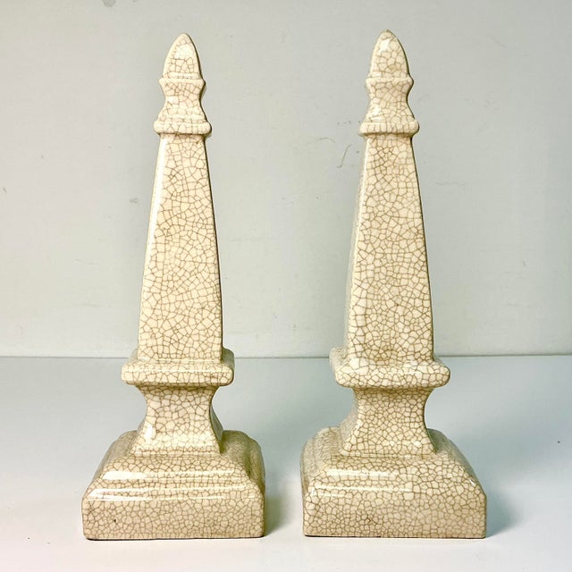 Vintage Home is pleased to offer this pair of vintage Crackle finished Ceramic Obelisks. The set is from the 1980s and...