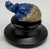 This exquisite hand-carved Lapis Lazuli "Hatching Turtle" sculpture is a remarkable blend of artistry and natural beauty....
