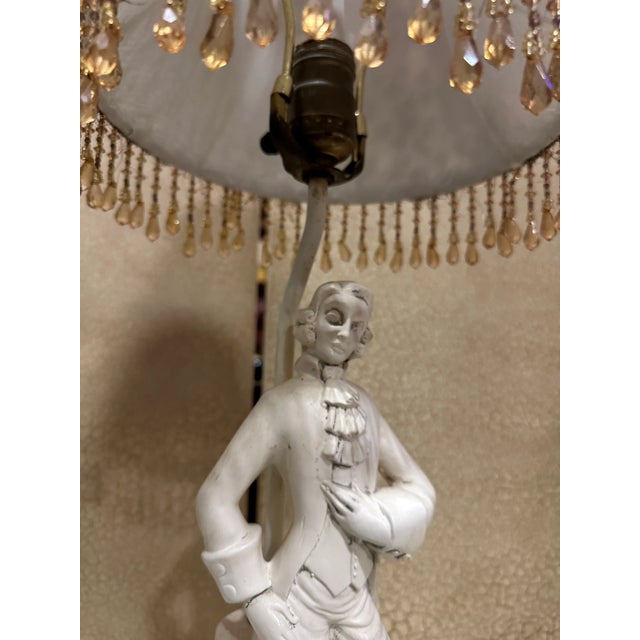 Up for consideration is a beautiful vintage figurative lamp with a ceramic man and leopard print lampshade. This is such a...