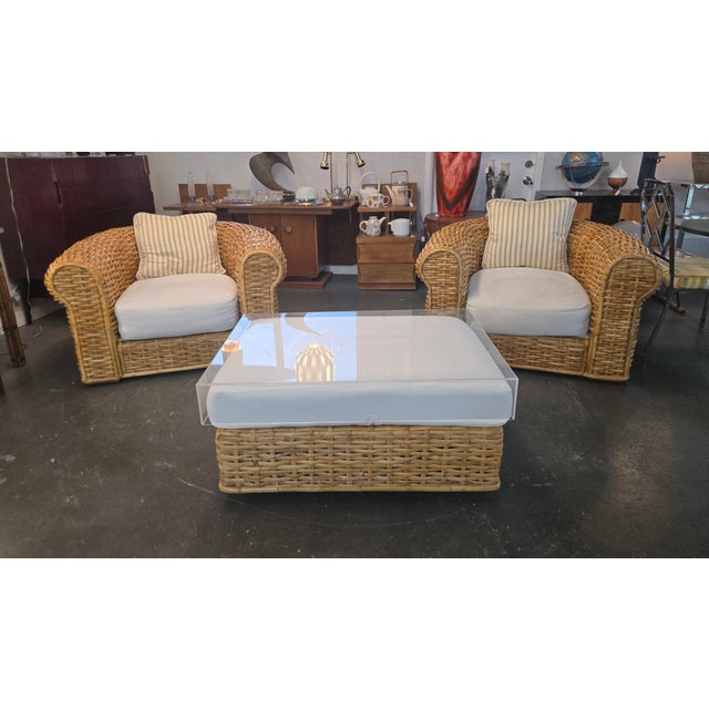 This 3 piece Bamboo set features 2 large and strong woven Bamboo tub chairs with cushions and an ottoman that has a...
