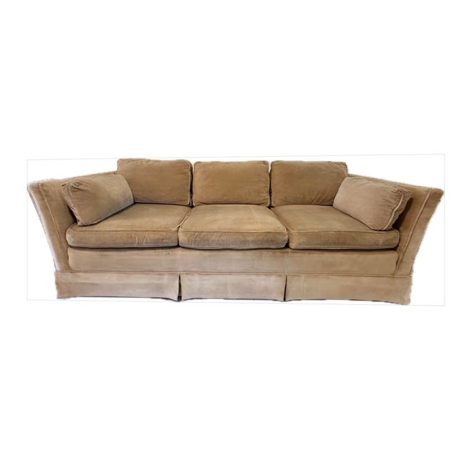 Vintage Mid-Century Modern Sofa by Baker Furniture, featuring a sophisticated low-profile tuxedo silhouette, and original...