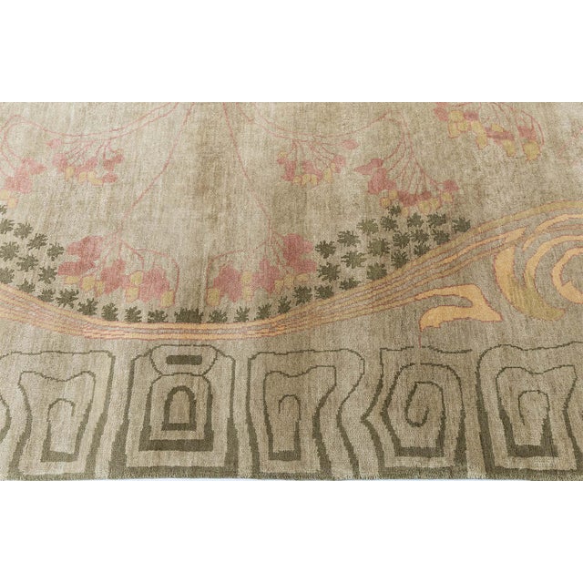 This modern Viennese design rug is a sophisticated homage to early 20th-century European decorative arts, drawing...