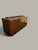 The vibrant grain of the Makassar ebony gives this large sideboard its distinctive character. Dark, warm brown grains...