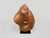 Minimalist sculpture hand carved from a single block of century old teak wood. Finished with a natural oil revealing the...