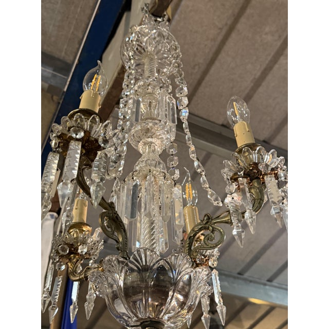 Crystal 4-Light Chandelier from Baccarat, in Very Good conditions. Designed before 1890 European Plug (up to 250V).The...