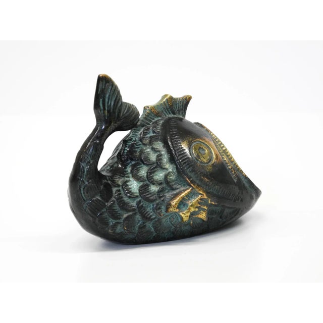 Original Mid-Century Modern bronze table or handheld ashtray by Walter Bosse. Beautiful, great design in the shape of a...