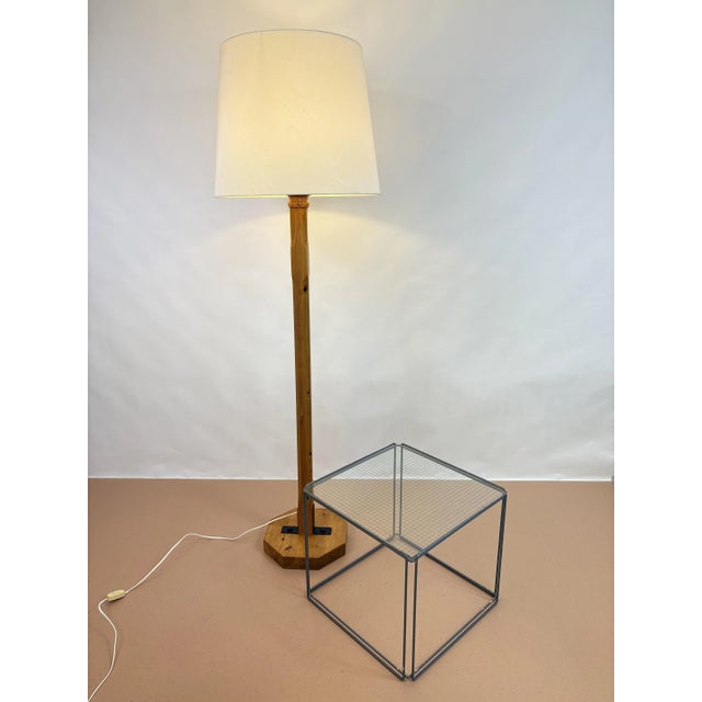 Pine wood vintage floorlamp made by Ab Ellysett Markaryd in Sweden from the 1960s. This piece has an attribution mark, I...