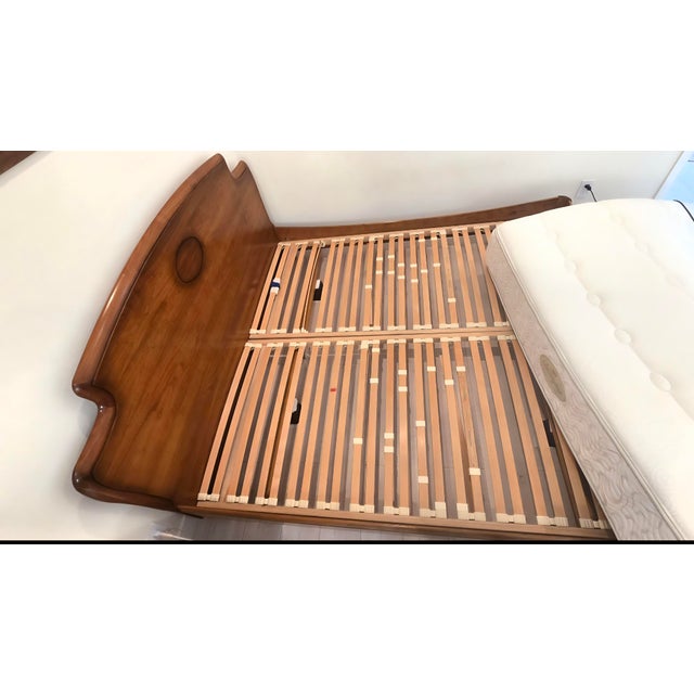 A Roche Bobois Honfleur King Sized Bedframe that was bought in 2003. The bedframe was made in Italy with solid cherry wood...