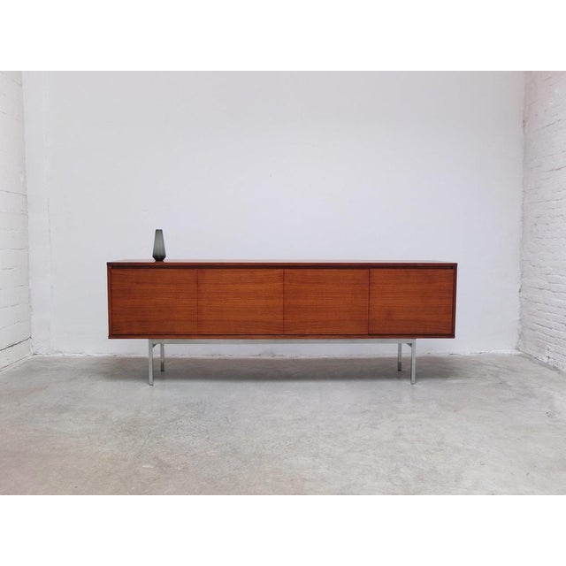 Beautiful large sideboard produced by Meubelfabriek Aurora in Belgium (Izegem) around 1970. This sideboard is made of...