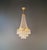 Antique Oval Crystal Chandelier in Brass Italy 1922 This stunning antique chandelier originates from Italy and was crafted...