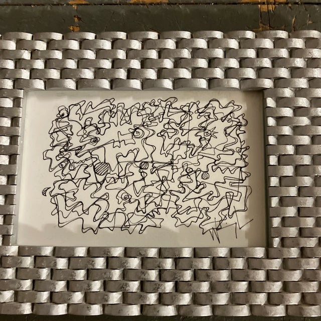 Original 4 x 6 ink drawing on paper signed bottom right Overall size with metal tabletop frame is 7 x 9