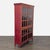 The hutch is crafted from solid Sheesham wood. It features a distressed, hand-painted red waxed patina, hand-forged iron...