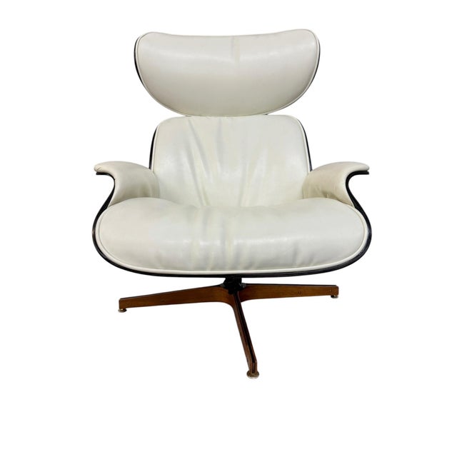 Relax in iconic style with this Mid-Century Modern Plycraft “Mr. Chair” and matching ottoman, inspired by the timeless...