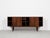 This sideboard is designed by Axel Christensen and manufactured by ACO Møbler in Denmark in the 1960s. This model is often...