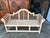 Handsome Coventry-labeled teak garden bench featuring an elaborate English Lutyens-style design. The sculptural back is...