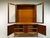 This highboard consists of two elements. The furniture was built in the 1950s in the Chippendale style (ornate structure,...