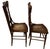 A Pair of Antique Oak Pressed Back Chairs with Cane Seats .