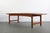 Stunning and substantial coffee table in teak designed for Dux. Gorgeous contoured lips on the sides of the coffee tabe,...