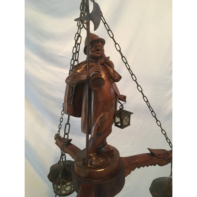 Outstanding German hand carved night watchman with three copper stained glass lights . Measures 30” x 30” x 40” . The...