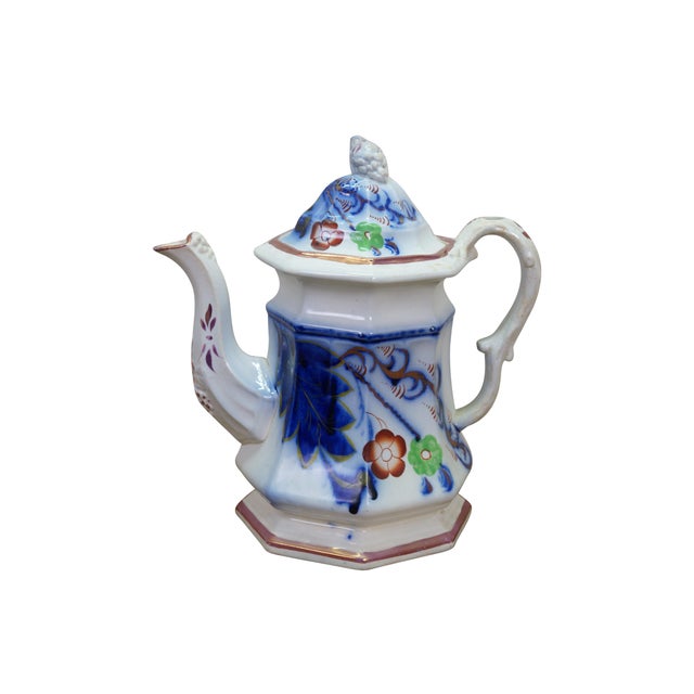 Antique Gaudy Welsh Ironstone cobalt / flow blue floral tea pot / pitcher and three shallow bowls / plates. Circa 1850s....