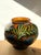 Glazed earthenware vase with botanical slip-trailed decoration, dating to around 1920. Marked HAK, from Herman A. Kähler’s...