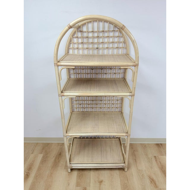 This gorgeous vintage arched blonde rattan lattice etagere is a warm and beautifully crafted coastal and boho display...