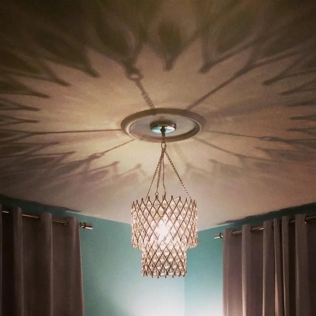 2009 Two-Tiered Double Drum Chrome and Crystal Chandelier from Atlana designer, Chandi Lighting. Talk about mood lighting!...