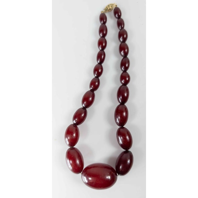 20th Century Art Deco Cherry Amber Bakelite Graduated Bead Necklace For Sale - Image 4 of 11