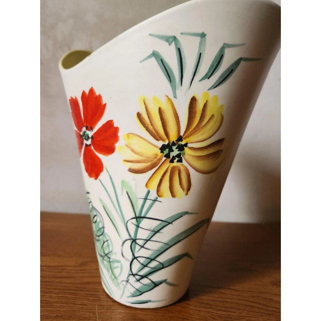Vintage 1950s french vallauris vase cone shaped with a wide neck that dips in the middle creating an interesting shape. It...