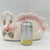 This vintage lusterware swan planter showcases a beautiful iridescent finish. It features pink accents, a gold beak, and...