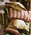 Our 100% yarn dyed Indian Cotton oblong Sonia cushion has a complementary colored ruche trim detail and duck feather insert.